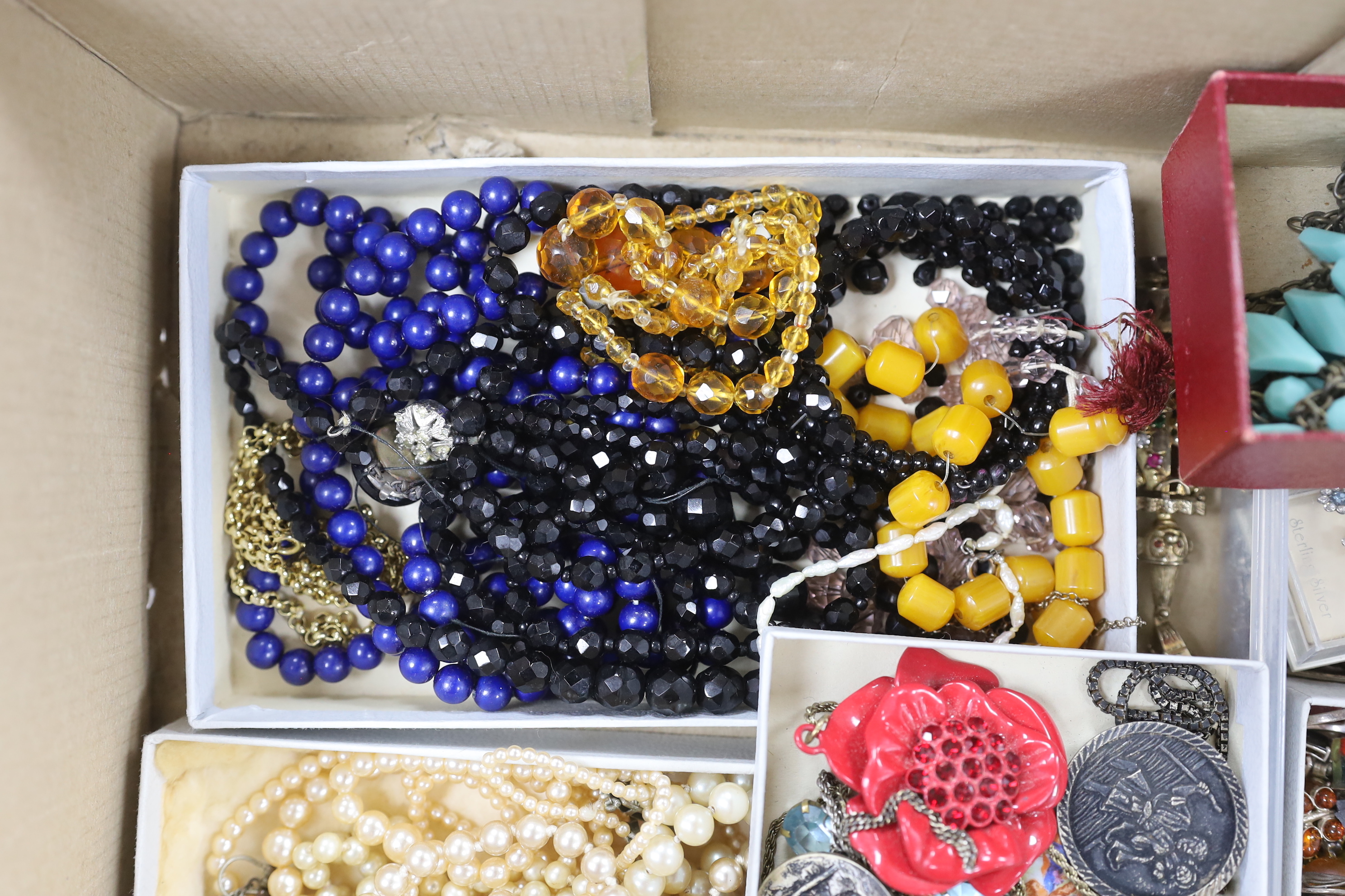 A quantity of assorted mainly costume jewellery including silver gilt and paste set articulated clown pendant on chain, etc.